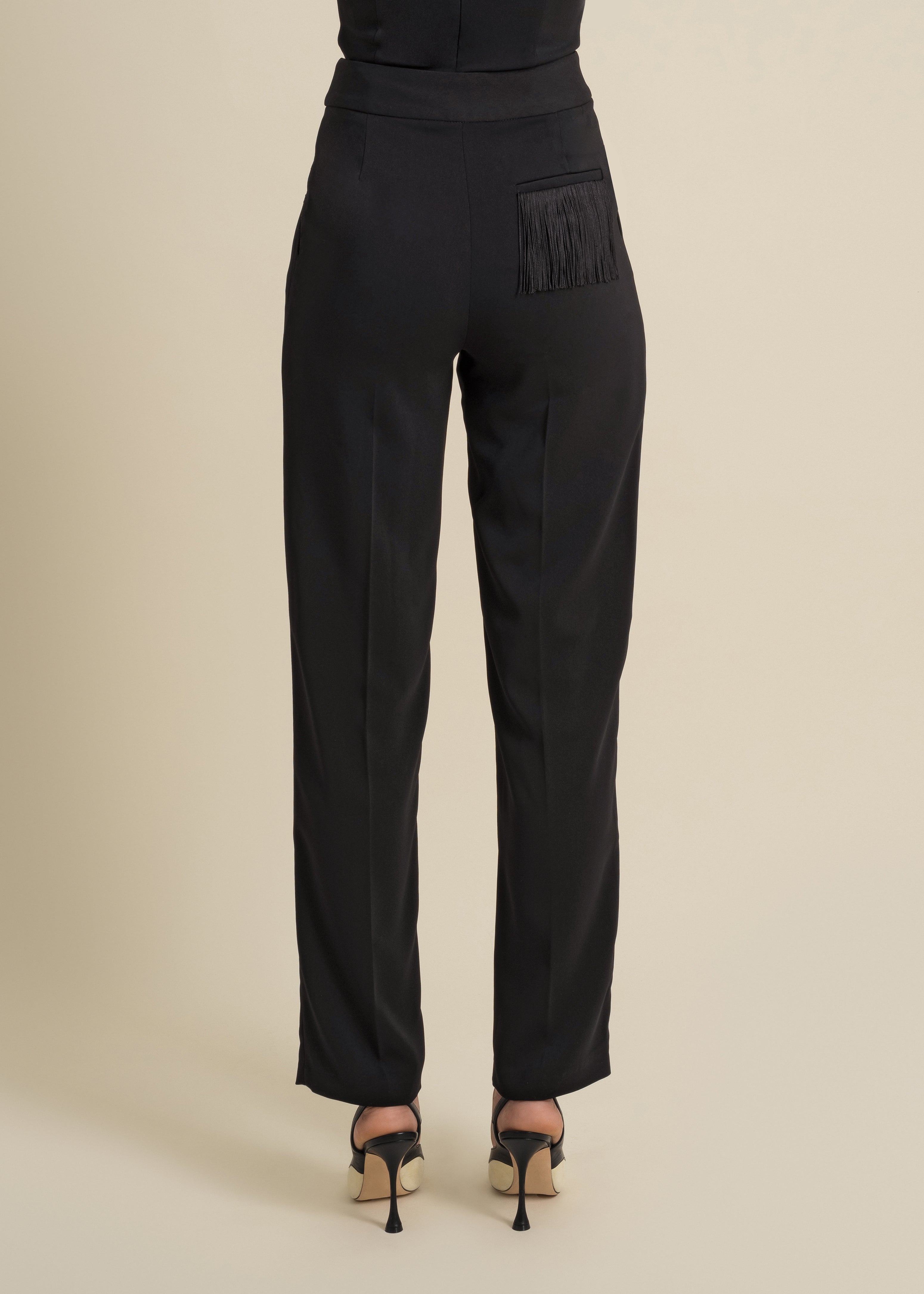 loose-fitted trousers with fringe accent